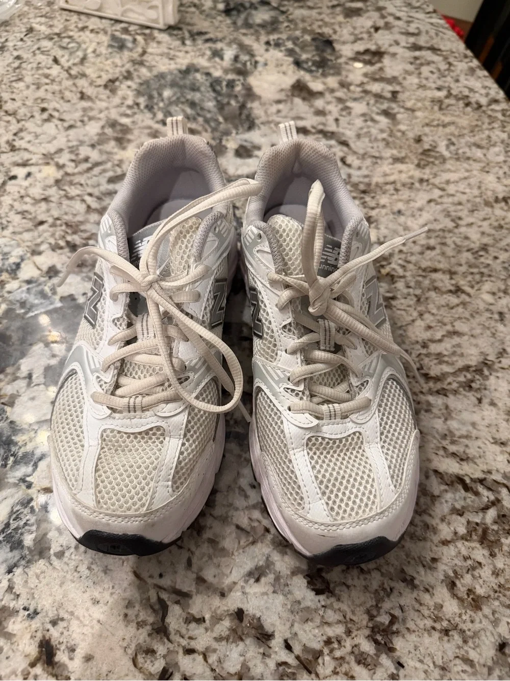 New Balance Women’s 530 Sneakers in White and Light Gray